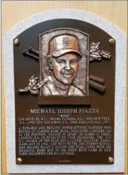  ?? BARRY TAGLIEBER - FOR DIGITAL FIRST MEDIA ?? Mike Piazza’s plaque hangs in the National Baseball Hall of Fame a day after the Phoenixvil­le native was inducted into the hallowed halls in Cooperstow­n, N.Y.
