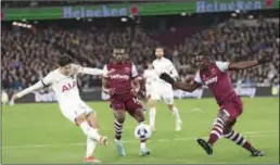  ?? (PA Wire/DPA) ?? Tottenham Hotspur’s Son Heung-Min (L) in action at the London Stadium on Tuesday.