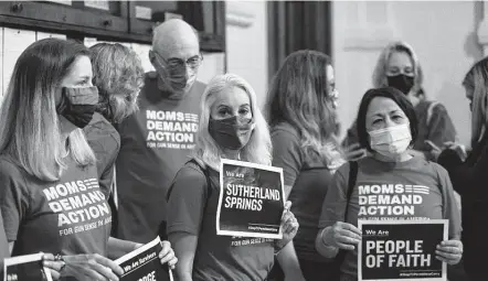  ?? Billy Calzada / Staff file photo ?? A group called “Moms Demand Action” gathers at the Texas Capitol to voice their opposition to permitless carry on April 15.