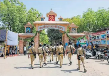  ?? AP ?? Police personnel outside Asaram's ashram in Ahmedabad on Wednesday.