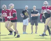  ?? KARL MONDON — BAY AREA NEWS GROUP ?? 49ers head coach Kyle Shanahan watches training camp with general manager John Lynch in August.