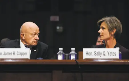  ?? Carolyn Kaster / Associated Press ?? Former National Intelligen­ce Director James Clapper and former acting Attorney General Sally Yates testify to a Senate Judiciary subcommitt­ee. “We believed that Gen. Flynn was compromise­d with respect to the Russians,” Yates said.