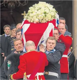  ??  ?? Baroness Thatcher’s coffin leaves St Paul’s Cathedral in London.