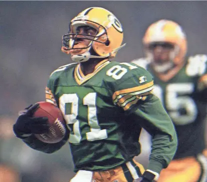  ?? JOURNAL SENTINEL FILES ?? Desmond Howard runs for daylight on his 99-yard kickoff return against New England in Super Bowl XXXI. Howard became the first Super Bowl MVP for a player seeing the majority of action on special teams.