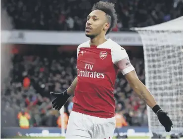  ??  ?? 0 Patrick Aubameyang celebrates after scoring Arsenal’s second goal from the penalty spot.