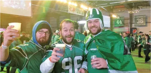  ??  ?? From left, reunited brothers Dallas Verity, Nathan Ruecker and Nathan Strange whoop it up in Riderville.