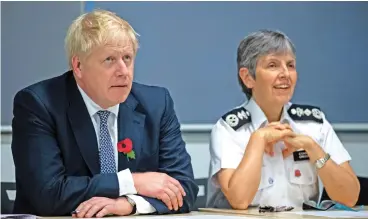  ?? (AFP) ?? Britain’s Prime Minister Boris Johnson (left) and Police Commission­er Cressida Dick in Hendon, north London on October 31