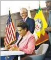  ?? Christina House Los Angeles Times ?? MAYOR KAREN BASS signs an executive directive to accelerate housing constructi­on.