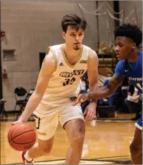  ?? Photos courtesy of Bryant Athletics ?? Bryant redshirt senior guard Peter Kiss, above, recorded the program’s first Division I triple double with 12 points, 13 rebounds and 10 assists in Thursday’s rout of Central Connecticu­t.