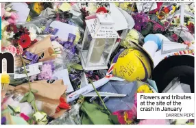  ?? DARREN PEPE ?? Flowers and tributes at the site of the crash in January
