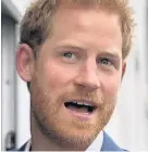  ??  ?? > Delighted: Prince Harry yesterday