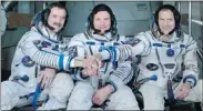  ?? MIKHAIL METZEL/ THE CANADIAN PRESS ?? Canadian Chris Hadfield, left, will command the crew, including Russian cosmonaut Roman Romanenko, centre and U.S. astronaut Thomas Marshburn.
