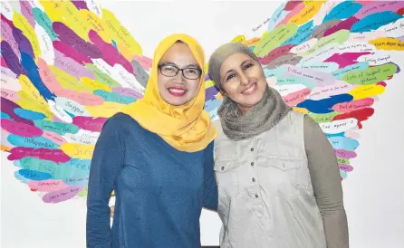  ??  ?? Lia Amaliah and Mahjouba Habbad are two of the 40 refugee women involved in the Stories to Freedom exhibition.