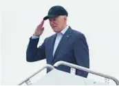  ?? MANUEL BALCE CENETA/AP ?? President Joe Biden salutes Friday as he boards Air Force One on his way to his Delaware home.