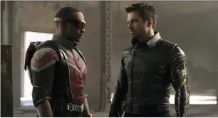  ?? COURTESY OF DISNEY PLUS ?? Anthony Mackie, left, and Sebastian Stan in a scene from “The Falcon and the Winter Soldier,” which began streaming Friday.