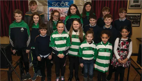  ??  ?? Competitor­s for this the Wicklow’s Scór na nÓg finals pose for a photo before they took to the stage to preform.