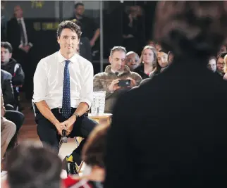  ?? RYAN REMIORZ/THE CANADIAN PRESS ?? About 60 complaints were filed with the federal Commission­er of Official Languages, most about Prime Minister Justin Trudeau answering English questions in French in Sherbrooke.