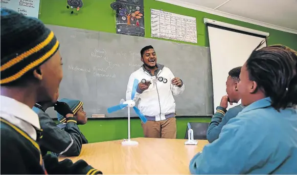  ??  ?? PASSIONATE APPROACH: Charles Duna Primary teacher Jarren Gangiah joined the school through Nelson Mandela University’s Centre for the Community School programme