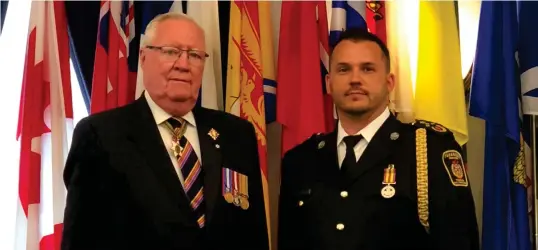 ??  ?? Lieutenant Governor W. Thomas Molloy and Chief of Moose Jaw & District EMS Kyle Sereda at the award ceremony.