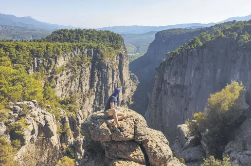  ??  ?? The infamous rock at Tazı Canyon has been the subject of too many well-liked Instagram photos and harrowing falls in the news.