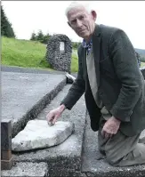  ??  ?? Michael O’Donoughue, Crookstown paying the rounds at St. Johns Well.