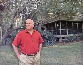  ?? LOU KRASKY / ASSOCIATED PRESS ?? LEFT: Pat Conroy stands at the back of his house on Fripp Island, S.C., in 2000. Conroy died two years ago Sunday.