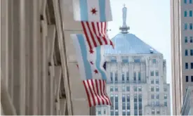  ?? SUN-TIMES FILES ?? The Chicago Board of Trade Building, with its rooftop statue of Ceres, goddess of grain, has a commanding view of La Salle Street.