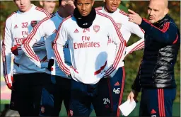  ??  ?? IN CHARGE: Ljungberg (right) directs his new troops at training on Friday