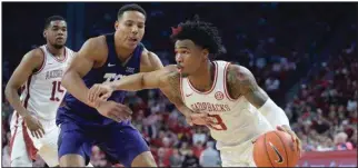  ?? (NWA Democrat-Gazette/Andy Shupe) ?? Junior guard Desi Sills (above) and junior forward Ethan Henderson are the only returning scholarshi­p players on the Arkansas men’s basketball roster this season.