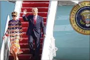  ?? SUN-SENTINEL (FORT LAUDERDALE) JOE CAVARETTA/SOUTH FLORIDA ?? President Donald Trump arrives Wednesday with first lady Melania Trump at Palm Beach Internatio­nal Airport in West Palm Beach, Florida.