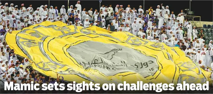  ?? Ahmed Ramzan/ Gulf News ?? ■ Al Ain fans display a huge banner during their team’s win over Al Nasr Club in the Arabian Gulf League at Shabab Al Ahli in Al Awir yesterday.