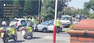  ??  ?? Emergency services at the scene of the crash on Tuesday