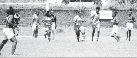  ?? ?? Part of the action between New Campbellvi­lle (gray) and Tucville in the girls section of the ExxonMobil U14 Football Championsh­ip