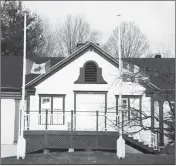  ?? ?? The Community Hall after Georgina Hornby died, with flags at half-mast