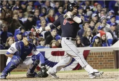  ??  ?? CHICAGO: Cleveland Indians’ Jason Kipnis hits a three-run home run during the seventh inning of Game 4 of the Major League Baseball World Series against the Chicago Cubs Saturday, in Chicago. —AP