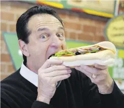  ?? ERIC PIERMONT / AFP / Getty Images ?? Subway co-founder and chief executive Fred DeLuca said last year he wants to add 8,000 franchises
to the existing 27,000 in the United States.