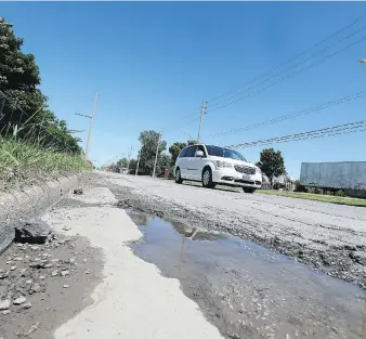  ?? DAN JANISSE ?? Windsor’s Seminole Street, shown on Monday, is ranked among the worst roads in Southweste­rn Ontario, according to a vote conducted by the Canadian Automobile Associatio­n.