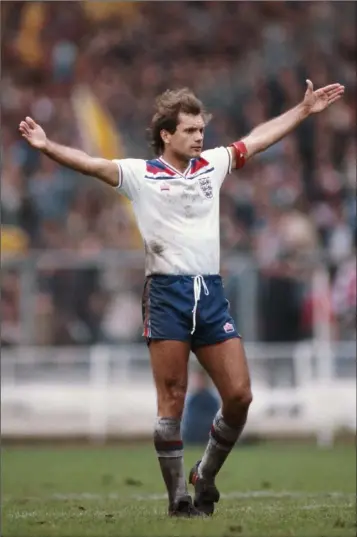  ??  ?? The late, great Ray Wilkins in action for England.