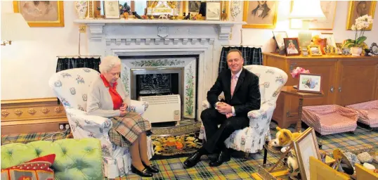  ?? Photo / Claire Trevett ?? It was quite a moment for then Prime Minister John Key when he met the Queen in 2013 but it was also an unforgetta­ble occasion for the woman who took the picture.