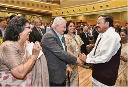  ?? — PTI ?? Vice-president and chairman of Rajya Sabha M. Venkaiah Naidu interacts with former MD of Tata Steel J.J. Irani and his spouse Daisy during the 100 years celebratio­n of Jamshedpur Steel City, Jharkhand, Monday.
