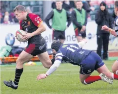  ??  ?? RGC outside centre Tom Hughes races forward during the clash with Llanelli last Saturday.