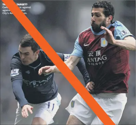  ??  ?? TRANSFER TARGET? Carlos Cuellar in against against Manchester City’s Adam Johnson.