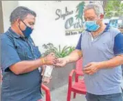  ?? AALOK SONI/HT PHOTO ?? The security staff of Skyline Oasis has been provided with masks and hand sanitisers. The society members have decided to avoid stepping out unless necessary.