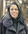  ?? AP PHOTO ?? In this file photo Omarosa Manigault smiles at reporters as she walks through the lobby of Trump Tower in New York. Manigault Newman is a cast member on “Celebrity Big Brother,” which premiered this past Thursday on CBS.