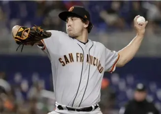  ?? Associated Press ?? Derek Holland struggled with the Giants and Cubs last season, going 2-5 with a 6.08 ERA as a starter and reliever.