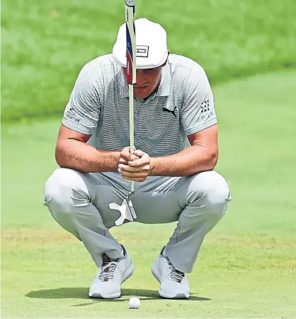  ?? Picture: Getty. ?? Bryson DeChambeau lines up a putt during last week’s Northern Trust in New Jersey.