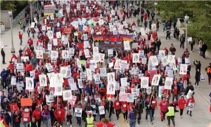  ?? Photograph: John Gress/ Reuters ?? Teachers protest during a rally and march on the first day of a teacher strike in Chicago, Illinois, on 17 October.