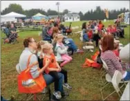  ??  ?? The crowd watches a performanc­e at one of the tents at the Unionville Community Fair last weekend.