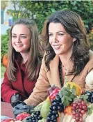  ??  ?? Rory (Alexis Bledel) and Lorelai (Lauren Graham) try to hit four Thanksgivi­ngs on “Gilmore Girls.” WB