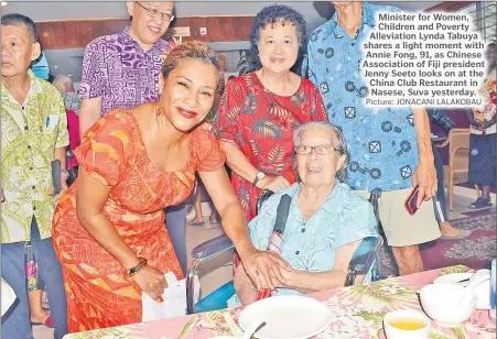  ?? Picture: JONACANI LALAKOBAU ?? Minister for Women, Children and Poverty Alleviatio­n Lynda Tabuya shares a light moment with Annie Fong, 91, as Chinese Associatio­n of Fiji president Jenny Seeto looks on at the China Club Restaurant in Nasese, Suva yesterday.